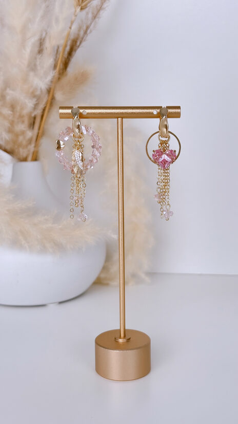 Auskari ar sirds un spārna kuloniem. Rozā