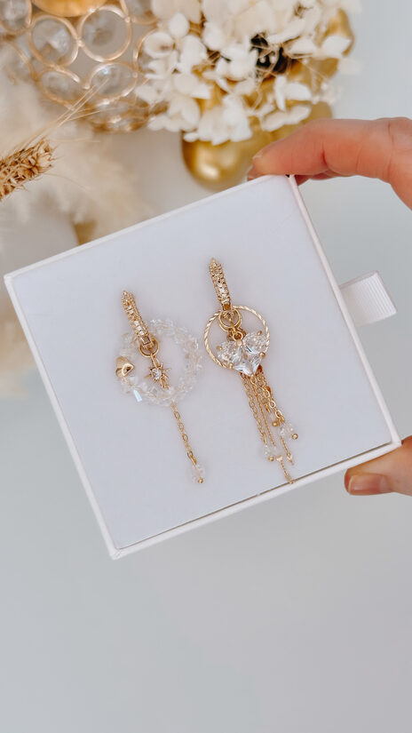 Auskari ar sirds un vakara zvaigzni. Caurspīdīgi akmentiņi.