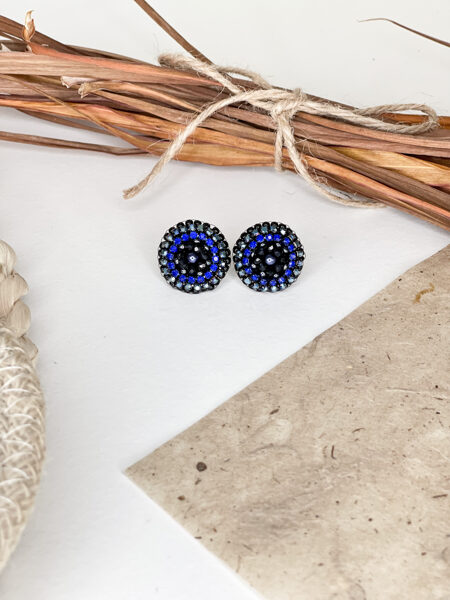 Zili podziņu auskari uz nagliņas